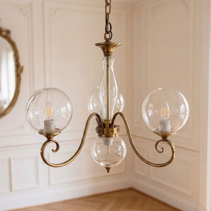 Gegoten messing globehanglamp