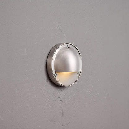 Compacte wandlamp van messing