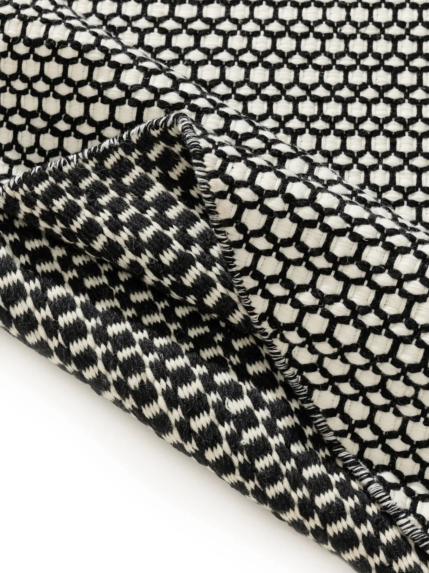 Handgeweven wollen tapijttextuur