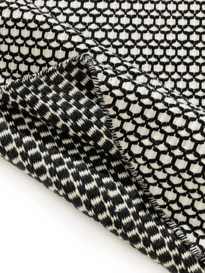 Handgeweven wollen tapijttextuur