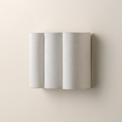 Golfvormige linnen wandlamp